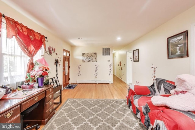 526 Azalea St, Culpeper, VA 22701 - sitting room with plenty of natural light, wood finished floors, a baseboard heating unit, a desk, and recessed lighting