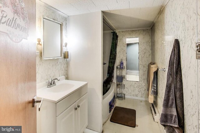 526 Azalea St, Culpeper, VA 22701 - full bathroom with vanity, tile patterned floors, shower / bath combo with shower curtain, crown molding, and wallpapered walls