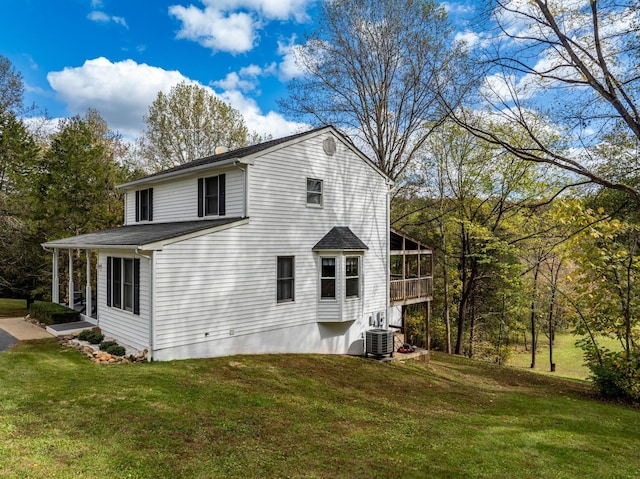 153 Heritage Hill Ln, Rochelle, VA 22738 - back of house featuring central air condition unit, a sunroom, and a yard