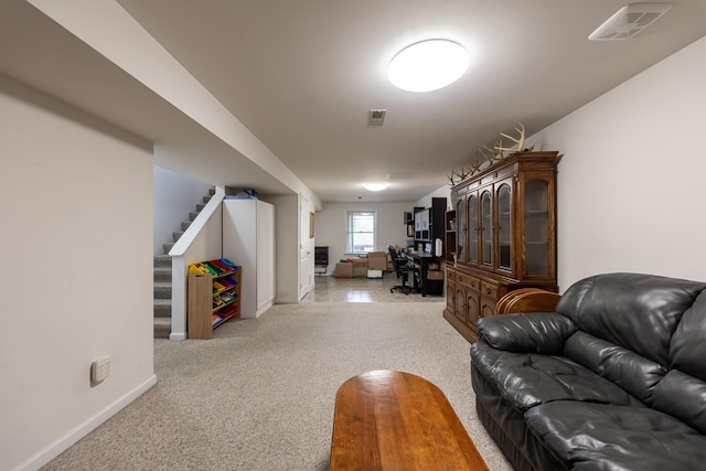 153 Heritage Hill Ln, Rochelle, VA 22738 - living area with light colored carpet, visible vents, baseboards, and stairs