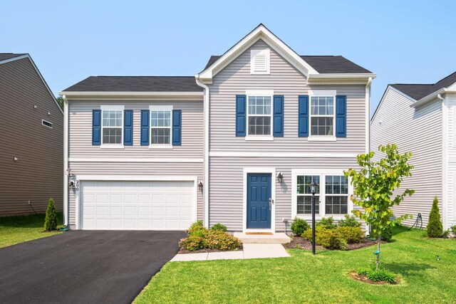 200 Overview St, Waynesboro, VA 22980 - traditional-style house with driveway, an attached garage, and a front lawn