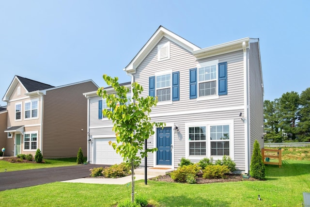 200 Overview St, Waynesboro, VA 22980 - view of front facade featuring a garage, asphalt driveway, and a front lawn