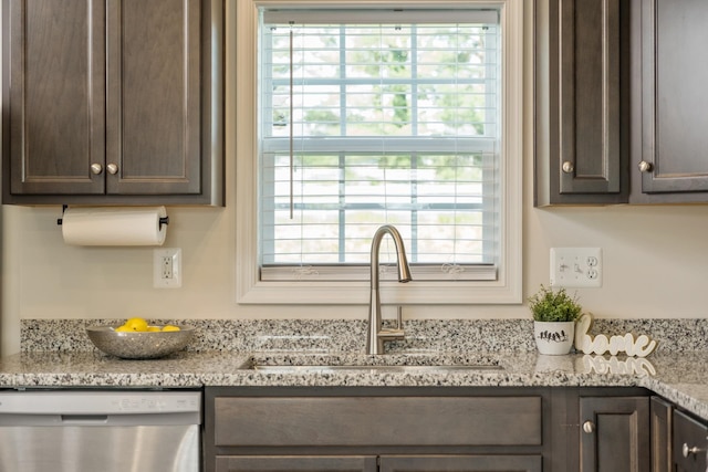 200 Overview St, Waynesboro, VA 22980 - kitchen with stainless steel dishwasher, dark brown cabinetry, plenty of natural light, and light stone counters