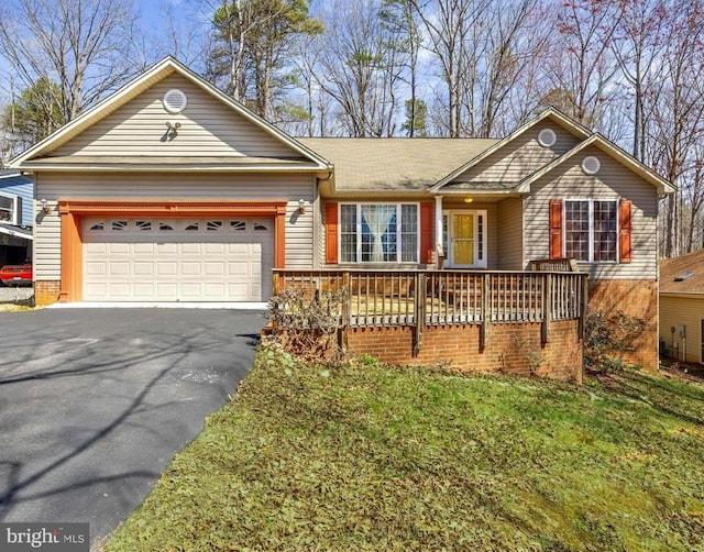 203 Birdie Rd, Locust Grove, VA 22508 - ranch-style house with driveway and an attached garage