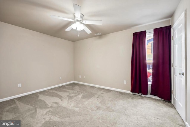 203 Birdie Rd, Locust Grove, VA 22508 - empty room with carpet, a ceiling fan, and baseboards