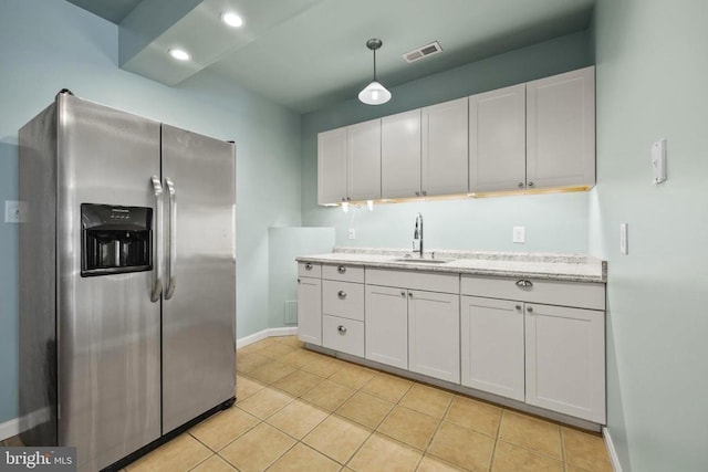 203 Birdie Rd, Locust Grove, VA 22508 - kitchen featuring stainless steel fridge with ice dispenser, a sink, white cabinets, baseboards, and light tile patterned floors