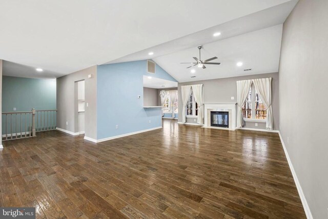 203 Birdie Rd, Locust Grove, VA 22508 - unfurnished living room featuring ceiling fan, wood finished floors, vaulted ceiling, baseboards, and recessed lighting