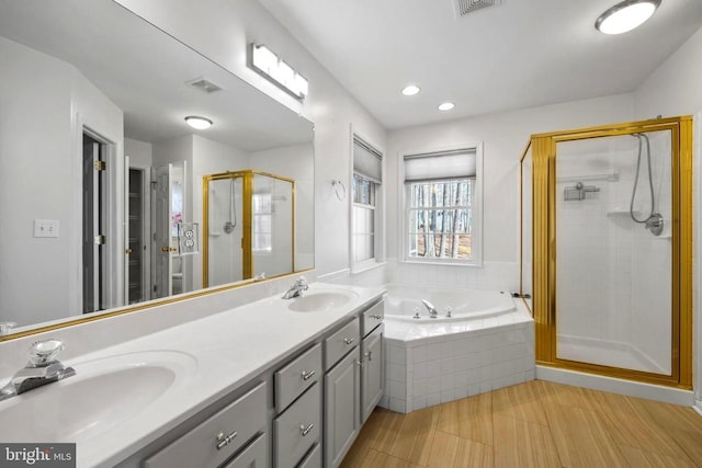 203 Birdie Rd, Locust Grove, VA 22508 - full bath featuring a garden tub, a shower stall, double vanity, and recessed lighting