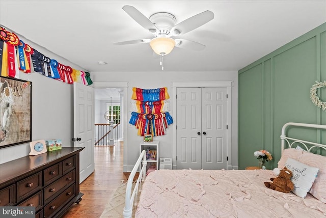 13515 Perimeter Dr, Fredericksburg, VA 22407 - bedroom with light wood-style floors, a closet, and a ceiling fan