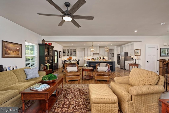  - living room featuring a ceiling fan, dark wood-type flooring, and recessed lighting