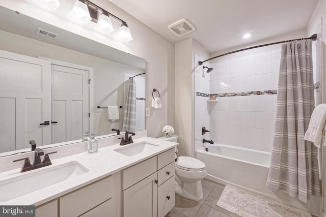  - bathroom featuring toilet, shower / bathtub combination with curtain, double vanity, tile patterned flooring, and recessed lighting