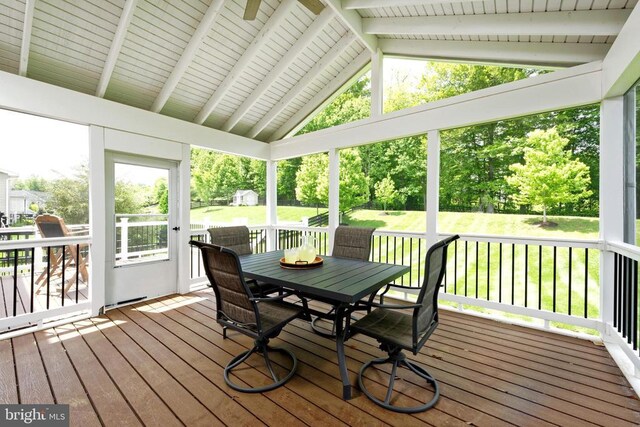  - sunroom / solarium with outdoor dining space