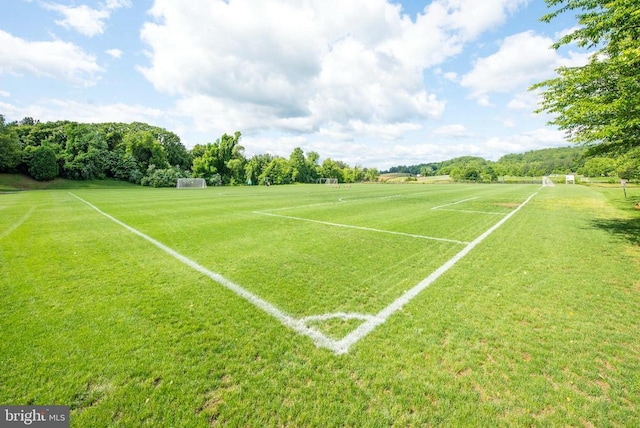  - view of tennis court with an area for sports