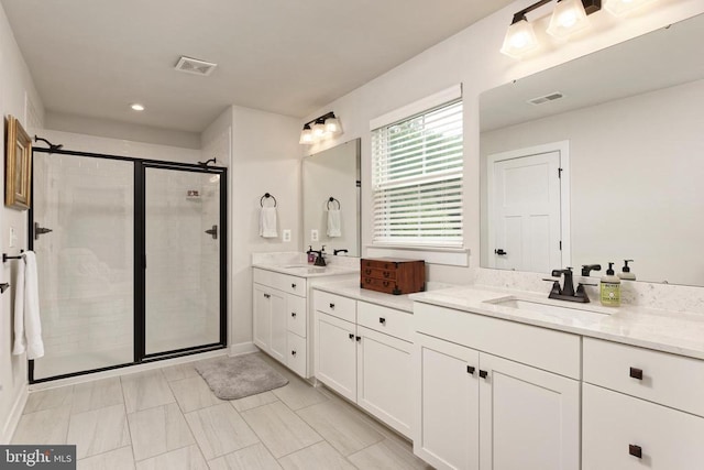  - bathroom featuring a shower stall, vanity, and recessed lighting