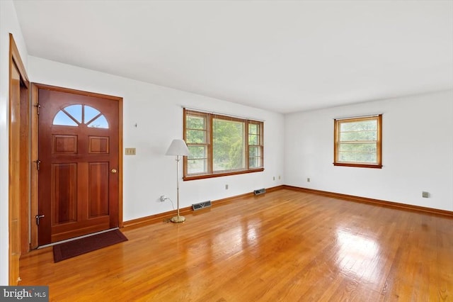 5524 Hickory Ridge Rd, Spotsylvania, VA 22551 - foyer entrance with plenty of natural light, wood finished floors, and baseboards