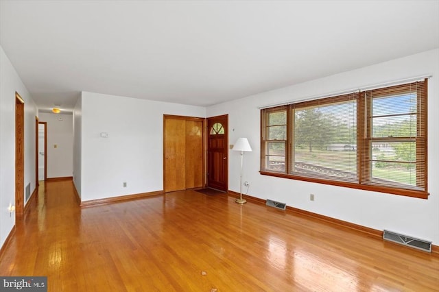 5524 Hickory Ridge Rd, Spotsylvania, VA 22551 - unfurnished living room with wood finished floors and baseboards