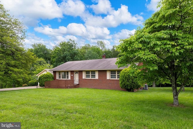 5524 Hickory Ridge Rd, Spotsylvania, VA 22551 - ranch-style home featuring brick siding, a front lawn, a carport, and a chimney