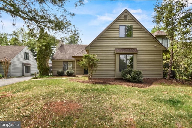 1132 Amber Ridge Rd, Charlottesville, VA 22901 - view of front of property with a front yard, roof with shingles, and a chimney