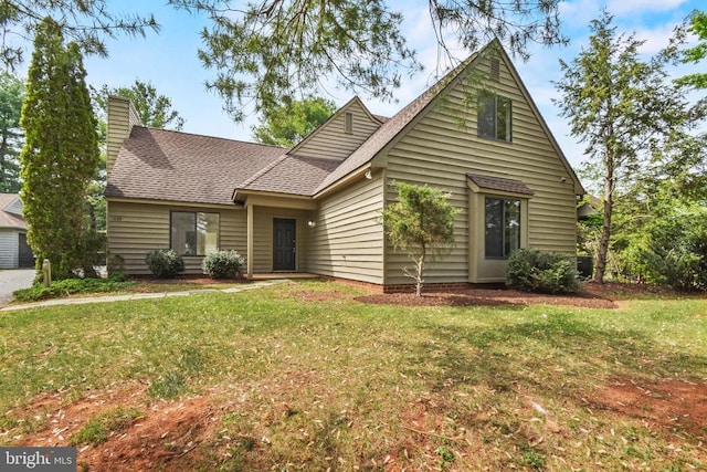 1132 Amber Ridge Rd, Charlottesville, VA 22901 - view of front of property with roof with shingles, a front yard, and a chimney