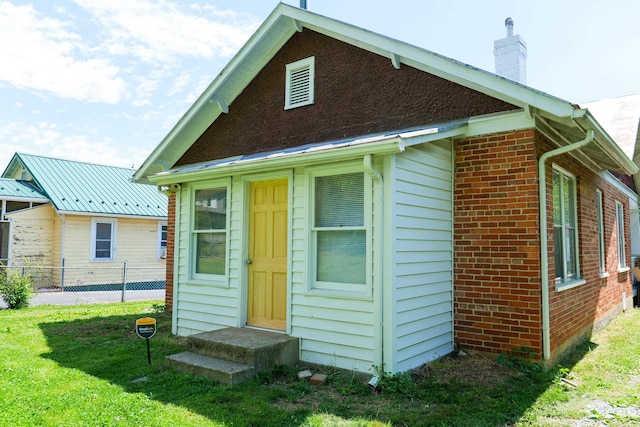 126 Park Blvd, Staunton, VA 24401 - back of house with a chimney and brick siding