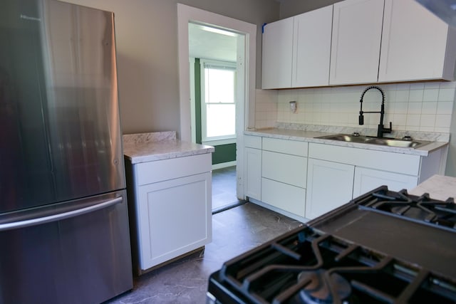 126 Park Blvd, Staunton, VA 24401 - kitchen with freestanding refrigerator, a sink, stove, and backsplash