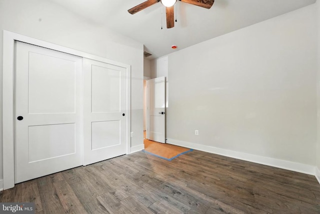 394 Pinehurst Rd, Gordonsville, VA 22942 - unfurnished bedroom with wood finished floors, baseboards, and a closet