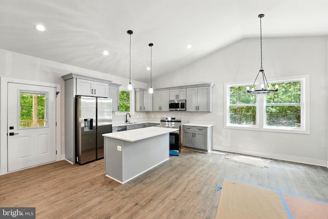 394 Pinehurst Rd, Gordonsville, VA 22942 - kitchen featuring stainless steel appliances, gray cabinetry, light countertops, a kitchen island, and wood finished floors