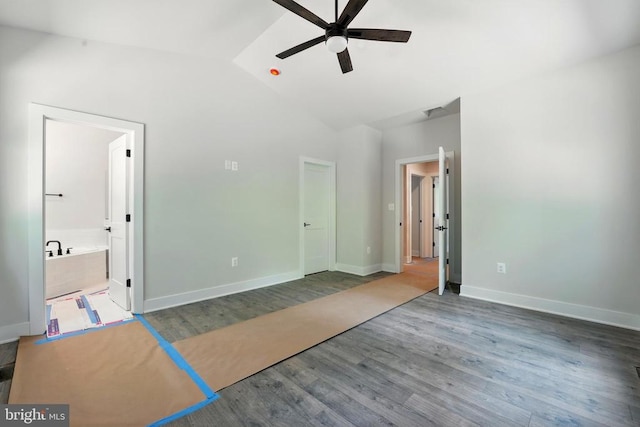394 Pinehurst Rd, Gordonsville, VA 22942 - unfurnished bedroom with wood finished floors, lofted ceiling, baseboards, and ensuite bath