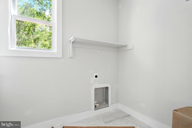 394 Pinehurst Rd, Gordonsville, VA 22942 - laundry area with electric dryer hookup, baseboards, light marble finish floors, and healthy amount of natural light
