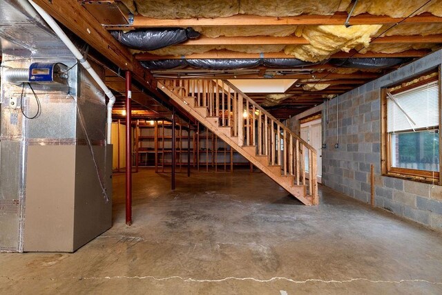 163 Valley View Ave, Mount Sidney, VA 24467 - basement with stairs, concrete block wall, and heating unit