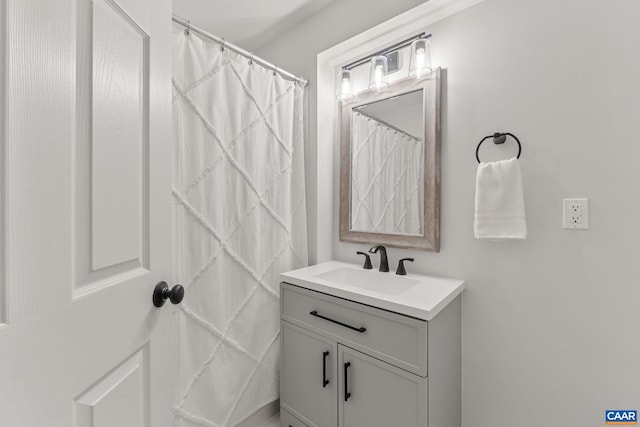 full bath featuring vanity
