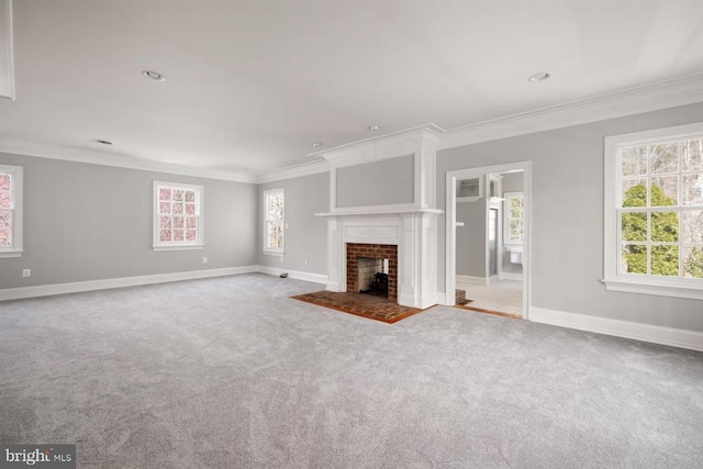  - unfurnished living room featuring ornamental molding, carpet floors, and a tile fireplace