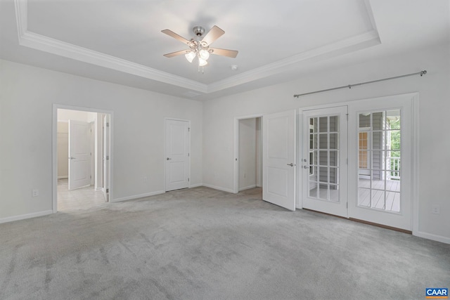 281 Manor Blvd, Palmyra, VA 22963 - empty room featuring a raised ceiling, ornamental molding, a ceiling fan, carpet floors, and baseboards