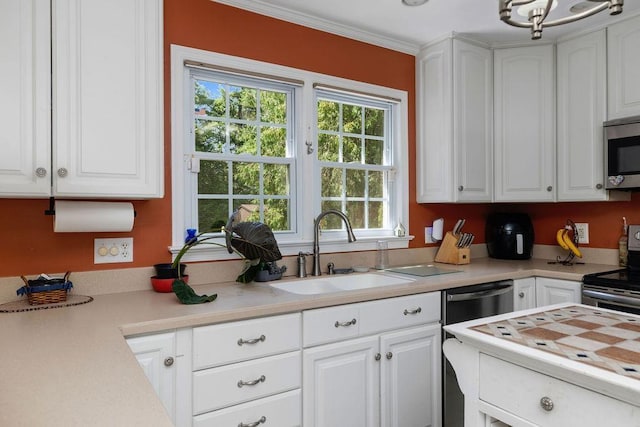935 Glenwood Blvd, Waynesboro, VA 22980 - kitchen featuring stainless steel appliances, light countertops, and white cabinetry