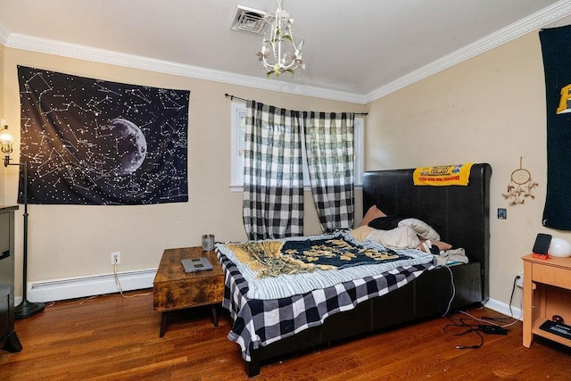 935 Glenwood Blvd, Waynesboro, VA 22980 - bedroom featuring a baseboard heating unit, a chandelier, wood finished floors, and crown molding