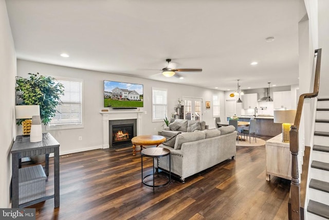 11405 Owls Nest Ct, Spotsylvania, VA 22551 - living room featuring a ceiling fan, dark wood finished floors, healthy amount of natural light, a glass covered fireplace, and recessed lighting