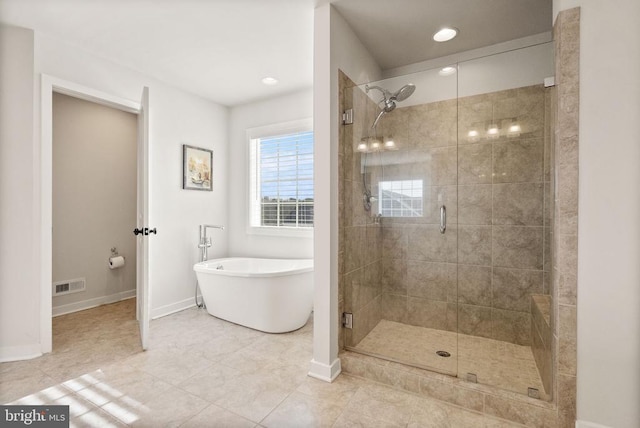 11405 Owls Nest Ct, Spotsylvania, VA 22551 - bathroom with a shower stall, a soaking tub, baseboards, and recessed lighting