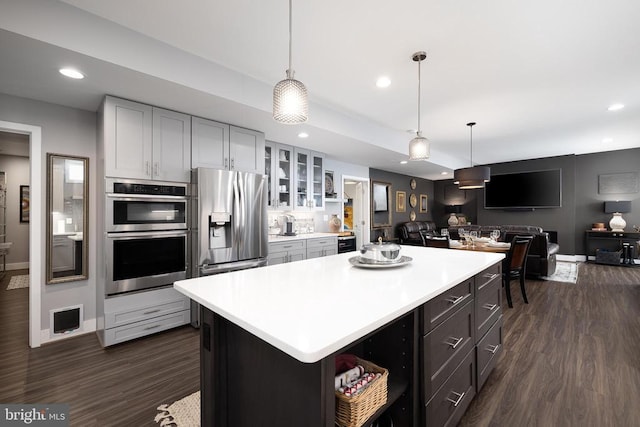 11405 Owls Nest Ct, Spotsylvania, VA 22551 - kitchen with stainless steel appliances, recessed lighting, dark wood finished floors, light countertops, and baseboards