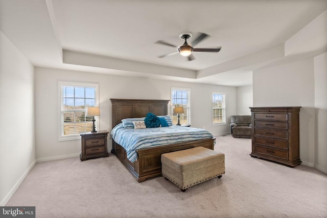 11405 Owls Nest Ct, Spotsylvania, VA 22551 - bedroom with light colored carpet, baseboards, a tray ceiling, and a ceiling fan