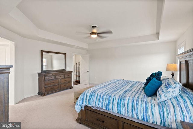11405 Owls Nest Ct, Spotsylvania, VA 22551 - bedroom with light colored carpet, a raised ceiling, baseboards, and a ceiling fan