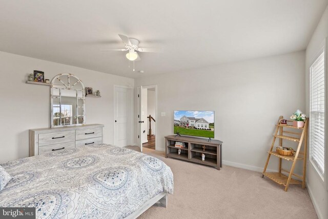 11405 Owls Nest Ct, Spotsylvania, VA 22551 - bedroom featuring light carpet, baseboards, and a ceiling fan