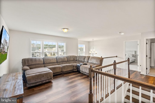 11405 Owls Nest Ct, Spotsylvania, VA 22551 - living room with a chandelier and dark wood-style floors