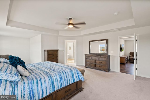 11405 Owls Nest Ct, Spotsylvania, VA 22551 - bedroom featuring a raised ceiling, light carpet, baseboards, and ceiling fan