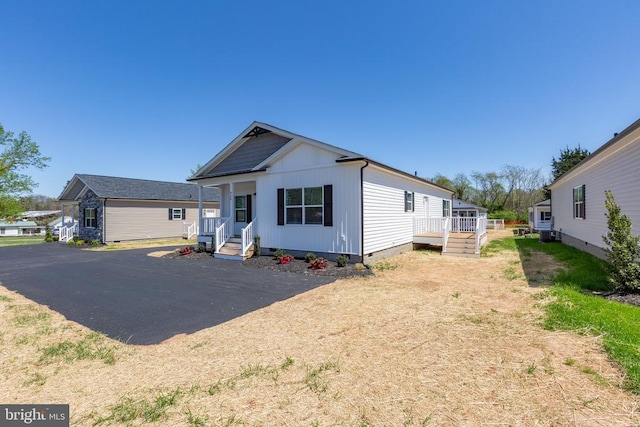 rear view of house featuring crawl space