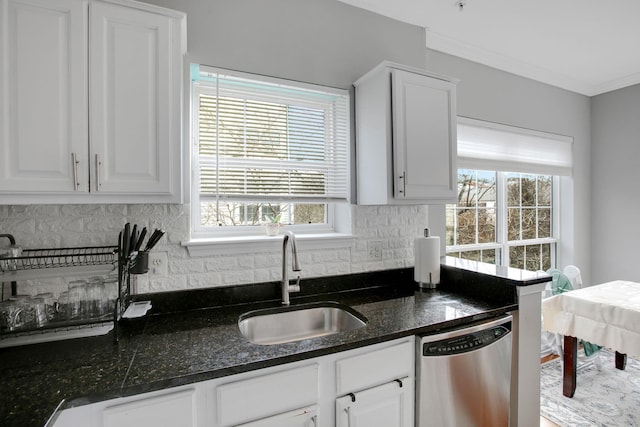 4551 Strutfield Ln Unit 4337, Alexandria, VA 22311 - kitchen featuring dark stone countertops, a sink, white cabinetry, stainless steel dishwasher, and tasteful backsplash