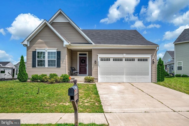 9323 Wood Creek Cir, Fredericksburg, VA 22407 - view of front facade featuring an attached garage, a front yard, and concrete driveway