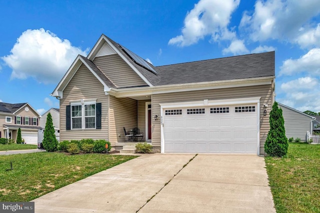 9323 Wood Creek Cir, Fredericksburg, VA 22407 - traditional home featuring a garage, driveway, and a front yard