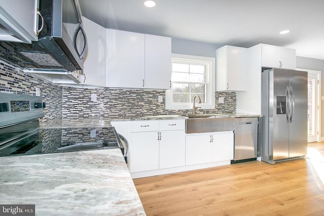 19196 Ferguson Ln, Jeffersonton, VA 22724 - kitchen with recessed lighting, light wood finished floors, backsplash, stainless steel appliances, and white cabinets
