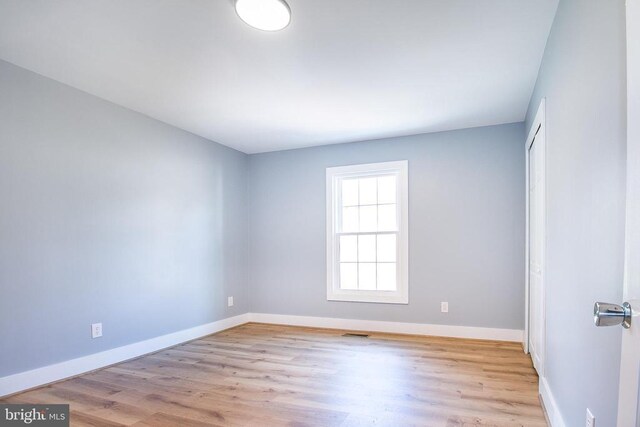 19196 Ferguson Ln, Jeffersonton, VA 22724 - unfurnished room with baseboards, visible vents, and wood finished floors