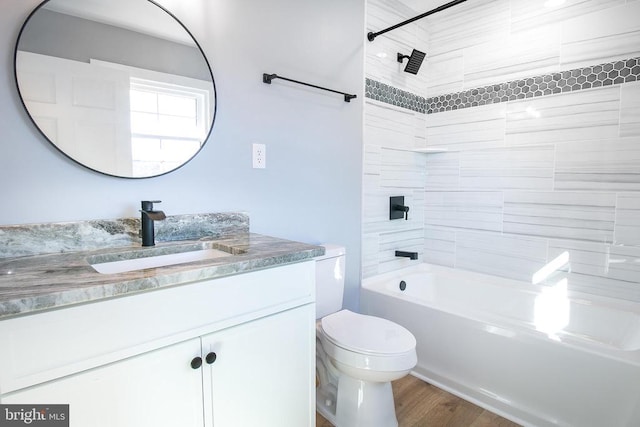19196 Ferguson Ln, Jeffersonton, VA 22724 - full bathroom with vanity, toilet,  shower combination, and wood finished floors